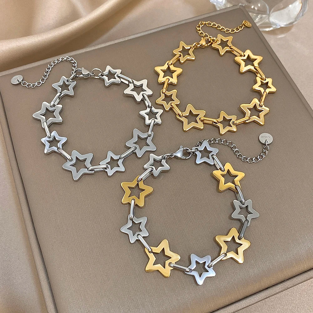 Armband met meerdere geometrische sterren goud en zilver