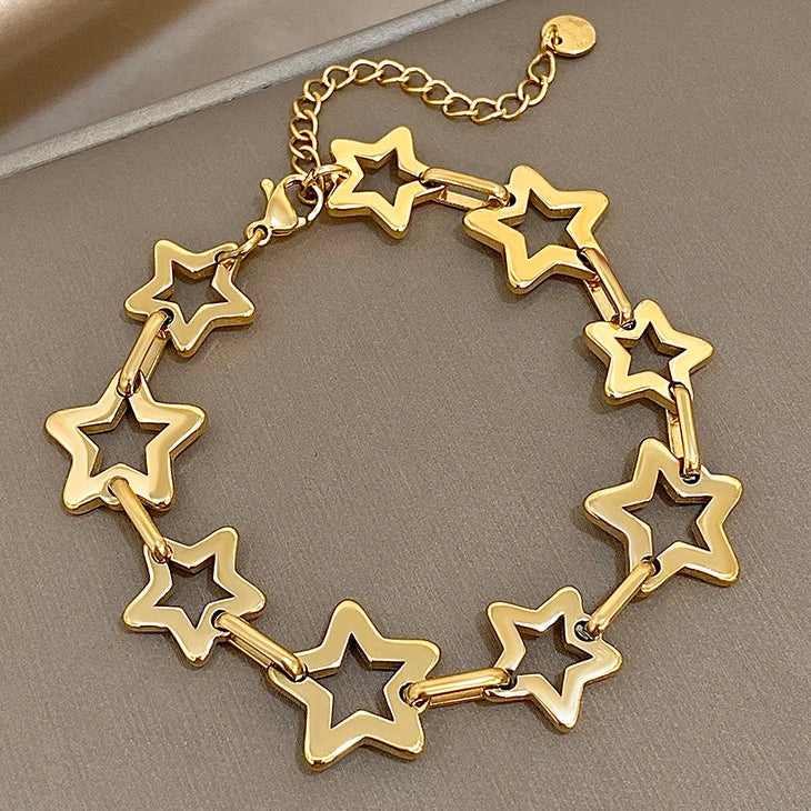 Armband met meerdere geometrische sterren goud