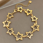 Armband met meerdere geometrische sterren goud