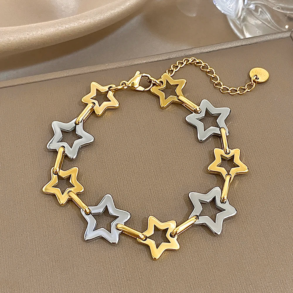 Armband met meerdere geometrische sterren goud en zilver