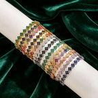 Armband met meerdere klavertjes van gekleurde kristallen
