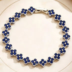 Armband met meerdere klavertjes van gekleurde kristallen zilver en blauw