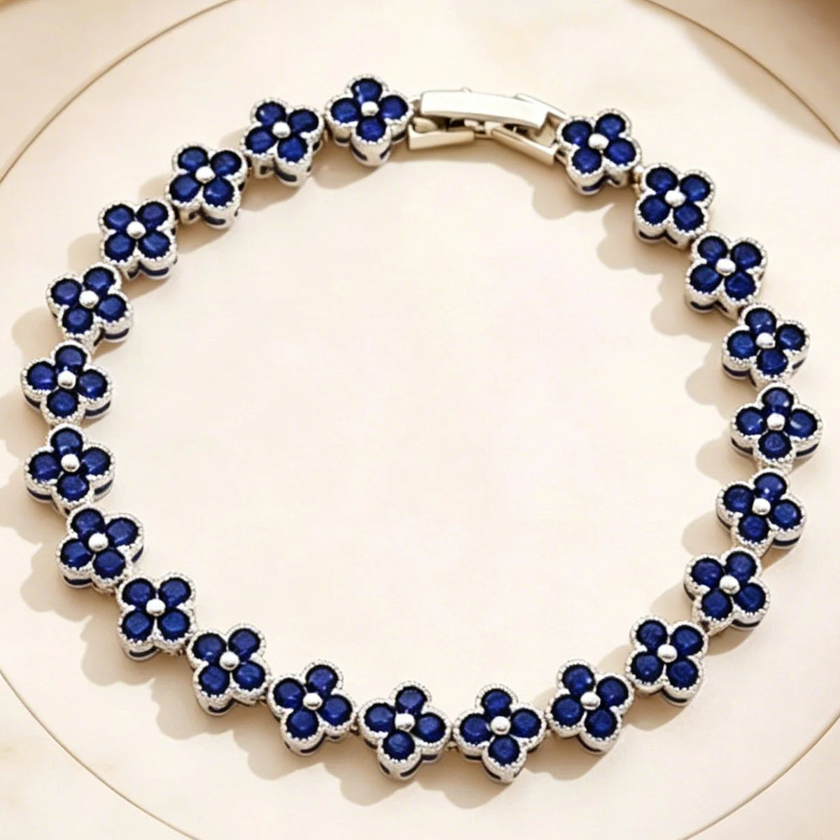 Armband met meerdere klavertjes van gekleurde kristallen zilver en blauw