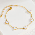 Armband met kleurenstaal van witte hartjes