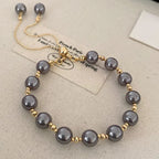 Armband met parel in eigentijdse stijl grijs
