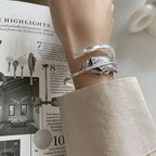 Zilverkleurige veerarmband voor dames