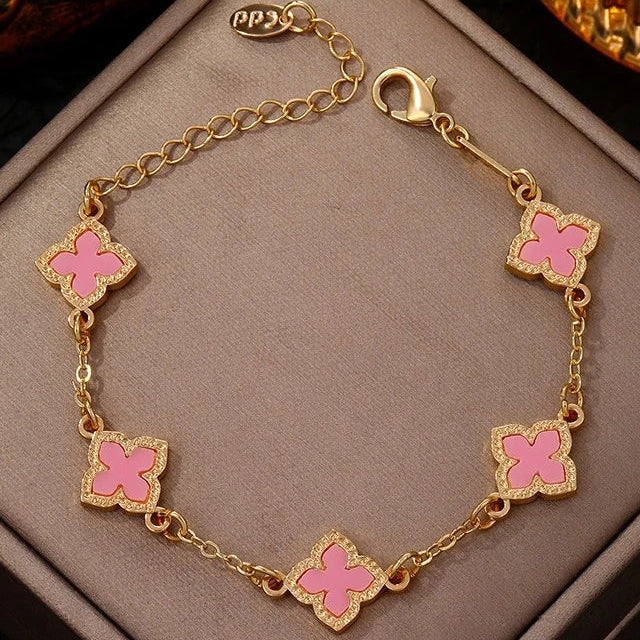 Armband met klavertjevier met parelmoereffect roze