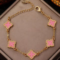 Armband met klavertjevier met parelmoereffect roze