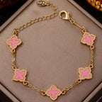 Armband met klavertjevier met parelmoereffect roze