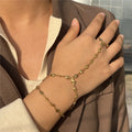 Hart hand- en vingerketting - handarmband voor dames goud