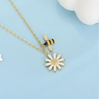 Halsketting met bijenhanger en madeliefje