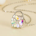 Ketting met hangslot-hanger met sprankelende klavertjevier