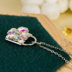 Ketting met hangslot-hanger met sprankelende klavertjevier