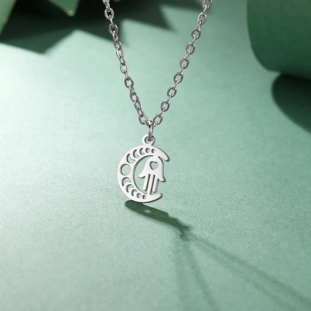 Ketting met islamitische hanger halve maan en Arabische Fatma-hand in zilver