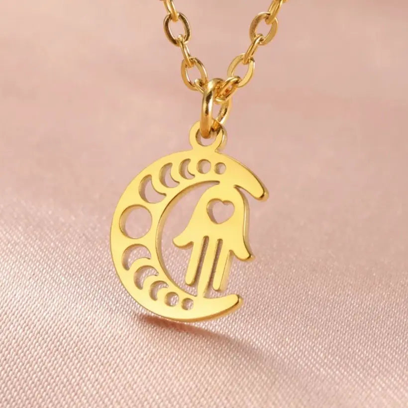 Ketting met islamitische hanger halve maan en Arabische Fatma-hand in goud