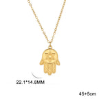 Halsketting met beschermend hangertje <span data-glossary-id="etoile-de-david">Davidster</span> en Fatma-hand in goud