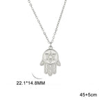 Halsketting met beschermend hangertje <span data-glossary-id="etoile-de-david">Davidster</span> en Fatma-hand in zilver