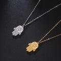 Halsketting met beschermend hangertje <span data-glossary-id="etoile-de-david">Davidster</span> en Fatma-hand in goud