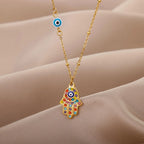 Halsketting met hanger ter bescherming tegen het boze oog en multicolor Arabische Fatma-hand goud