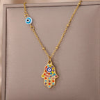 Halsketting met hanger ter bescherming tegen het boze oog en multicolor Arabische Fatma-hand goud