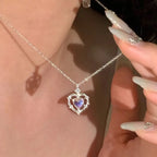 Ketting met dubbele hart-hanger met maansteen