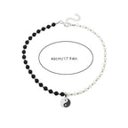 Collier avec Pendentif en Perles Yin Yang Noir et Blanc