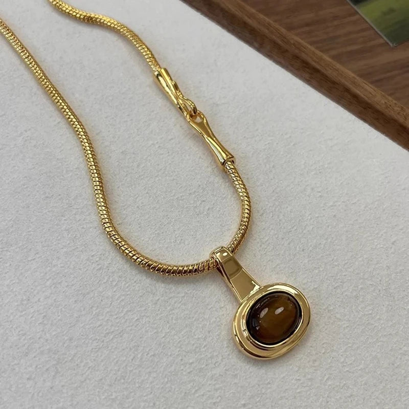 Ketting met hanger van ovale tijgeroogsteen