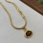 Ketting met hanger van ovale tijgeroogsteen