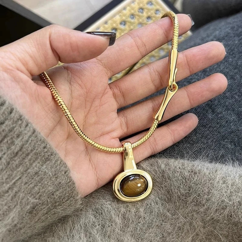Ketting met hanger van ovale tijgeroogsteen
