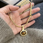 Ketting met hanger van ovale tijgeroogsteen