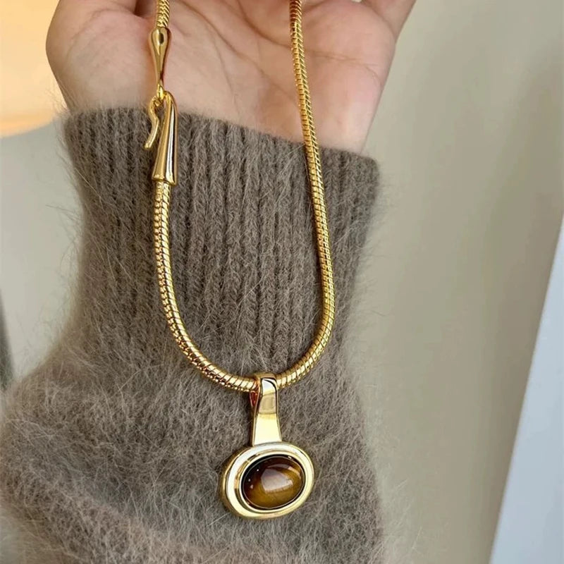 Ketting met hanger van ovale tijgeroogsteen