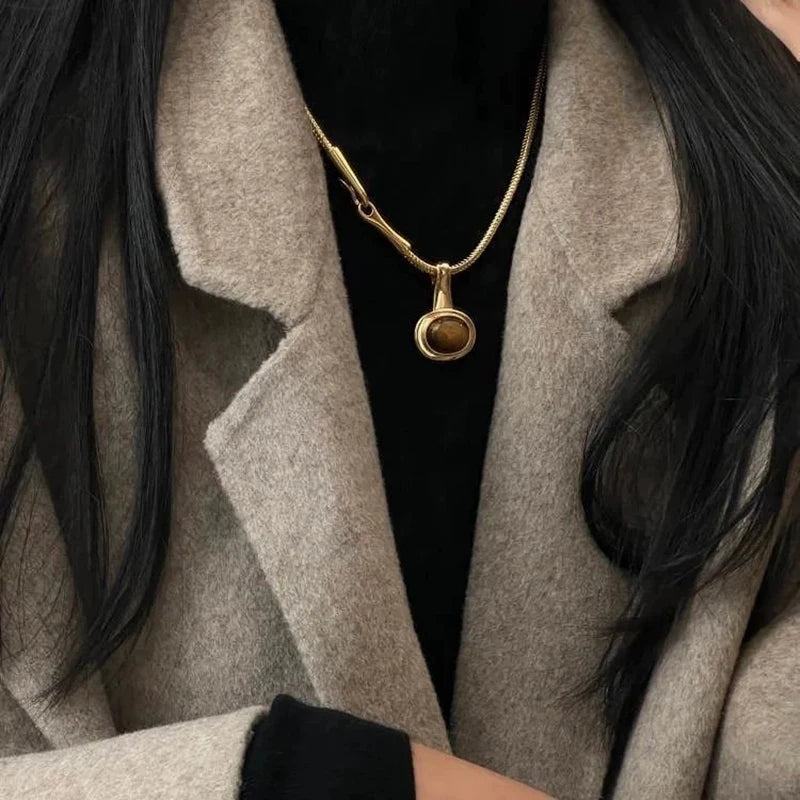 Ketting met hanger van ovale tijgeroogsteen