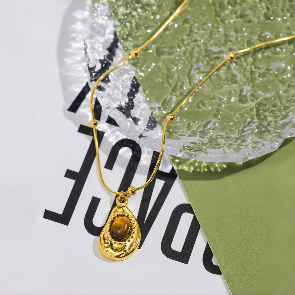 Ketting met waterdruppelvormige hanger van natuurlijke tijgeroogsteen