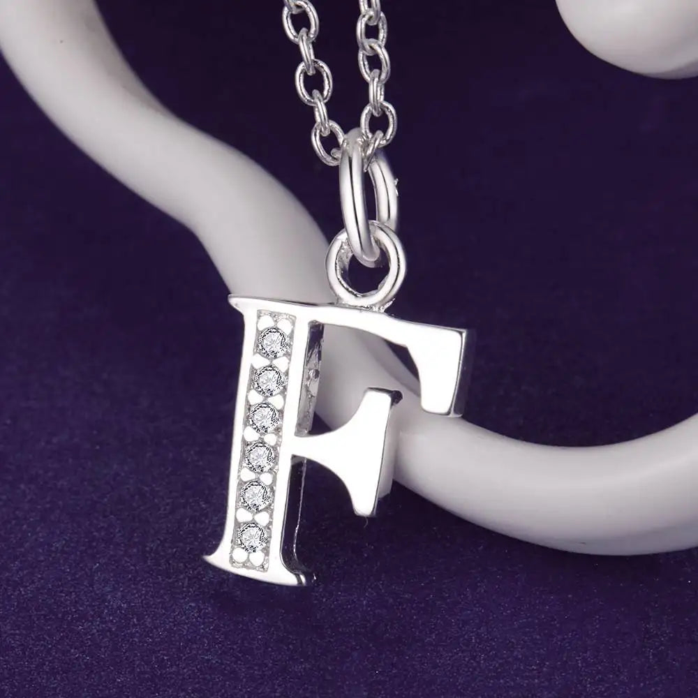 Lange ketting met initialenhanger f