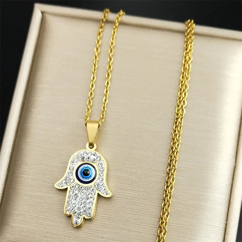 Lange ketting met hanger ter bescherming tegen het boze oog en Arabische Fatma-hand goud