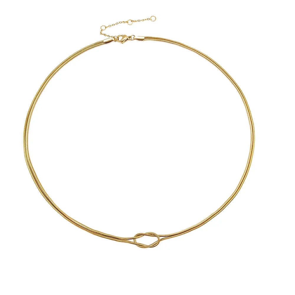 Halsketting met minimalistische knoophanger goud