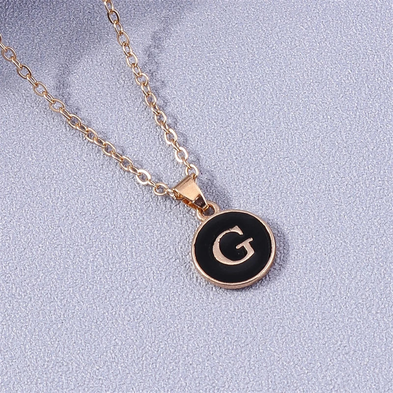 Halsketting met gekleurde initiaalhanger g