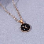 Halsketting met gekleurde initiaalhanger x