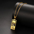 Ketting met palmboom- en strandgolfhanger goud