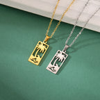 Ketting met palmboom- en strandgolfhanger goud
