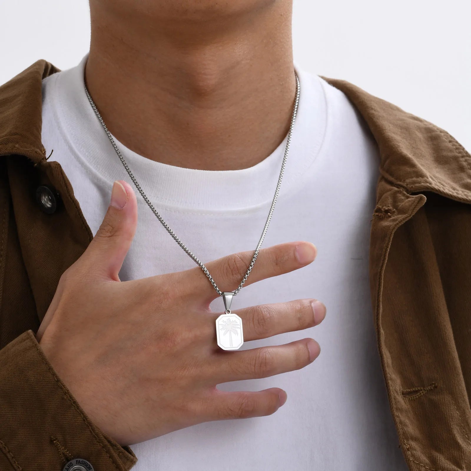 Halsketting met geometrische palmhanger in zilver