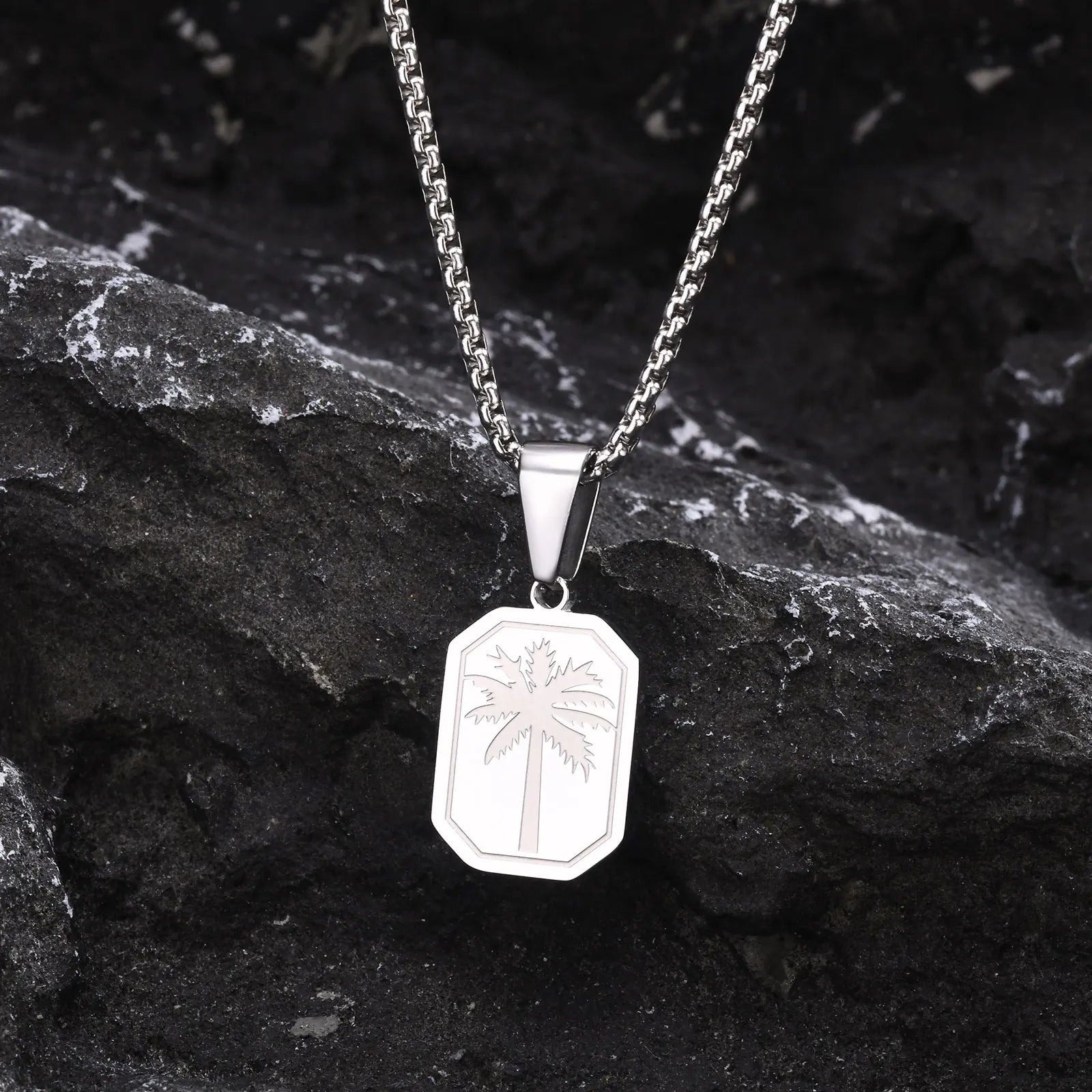 Halsketting met geometrische palmhanger in zilver