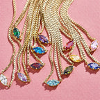 Ketting met oogvormige hanger met geboortesteen maart