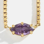 Ketting met oogvormige hanger met geboortesteen februari