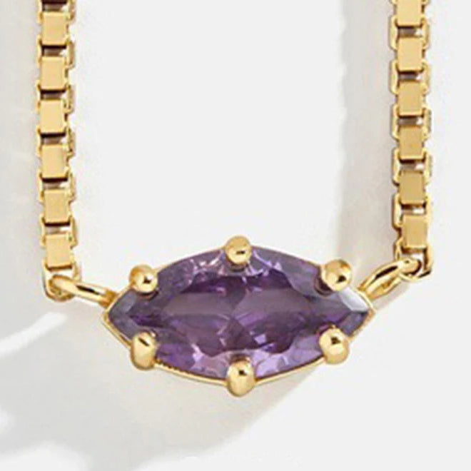 Ketting met oogvormige hanger met geboortesteen februari