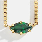 Ketting met oogvormige hanger met geboortesteen mei