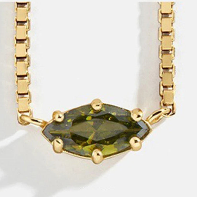 Ketting met oogvormige hanger met geboortesteen augustus