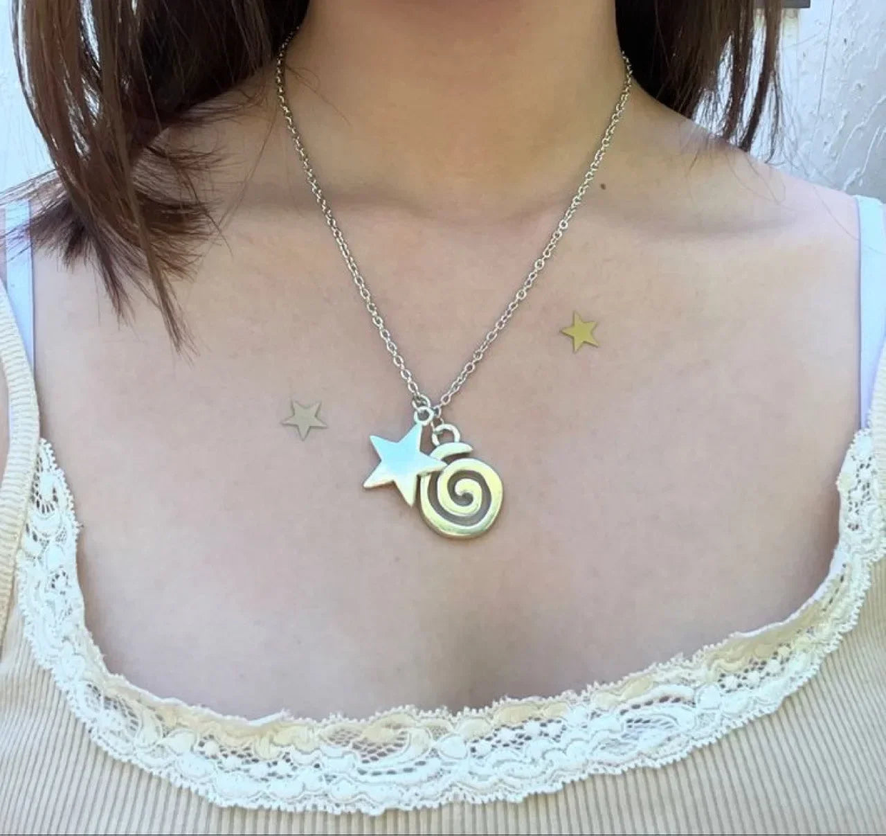 Ketting met spiraalhanger en kleine ster