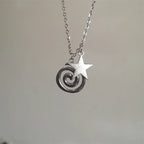 Ketting met spiraalhanger en kleine ster