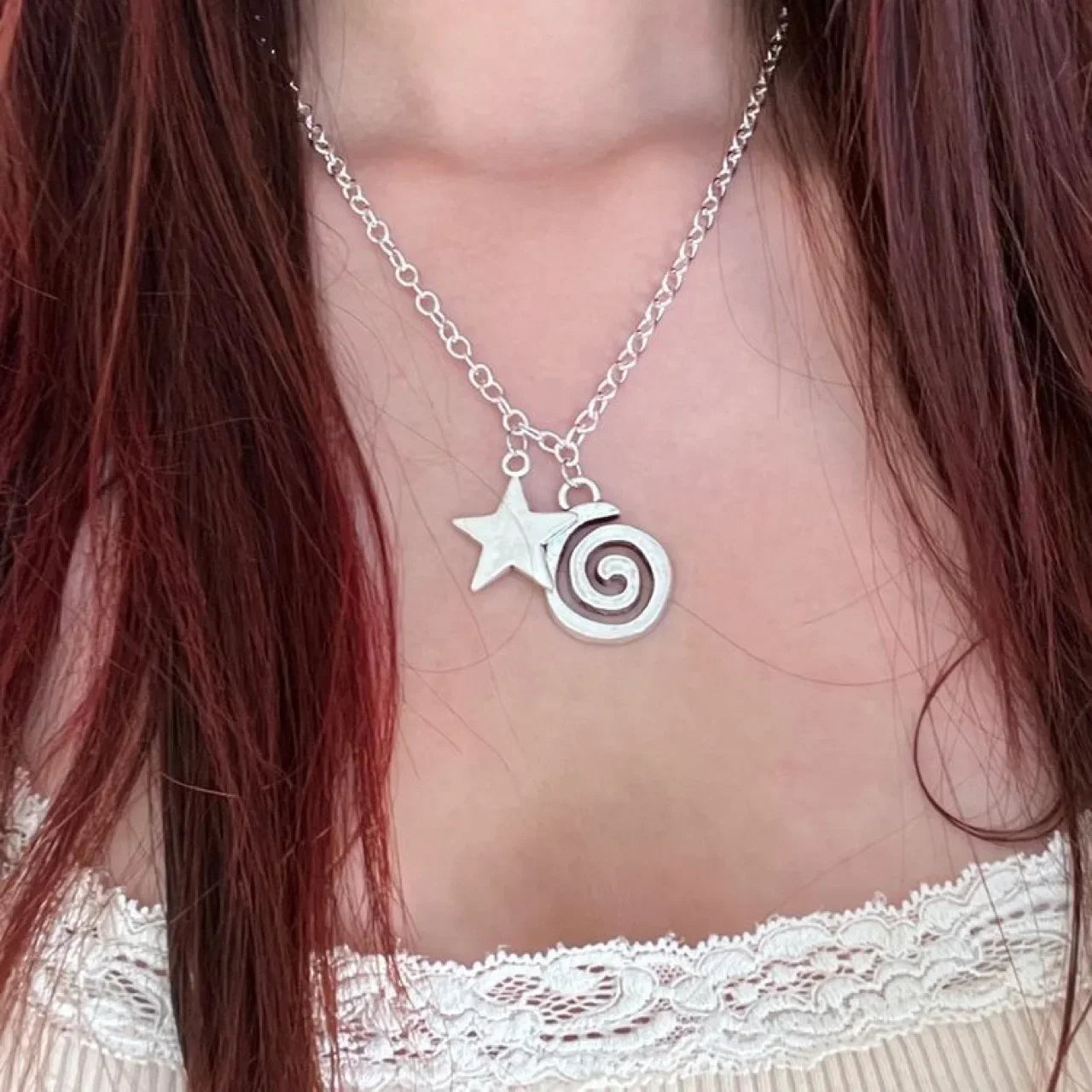Ketting met spiraalhanger en kleine ster